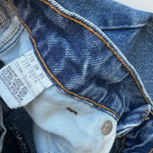 Load image into Gallery viewer, 90s Levi’s cut off shorts (Age 7)
